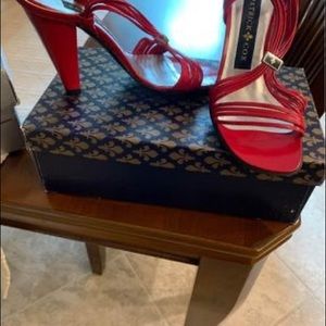 New red high heel shoes. Size 6.